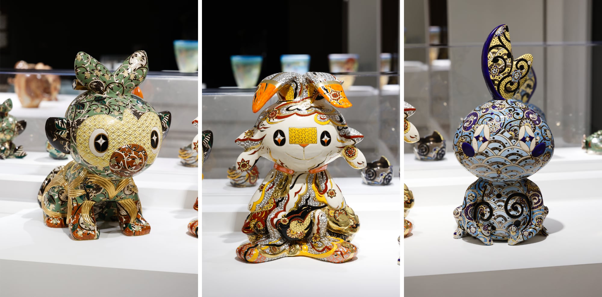 three images of small ceramic creatures covered in ornate patterns