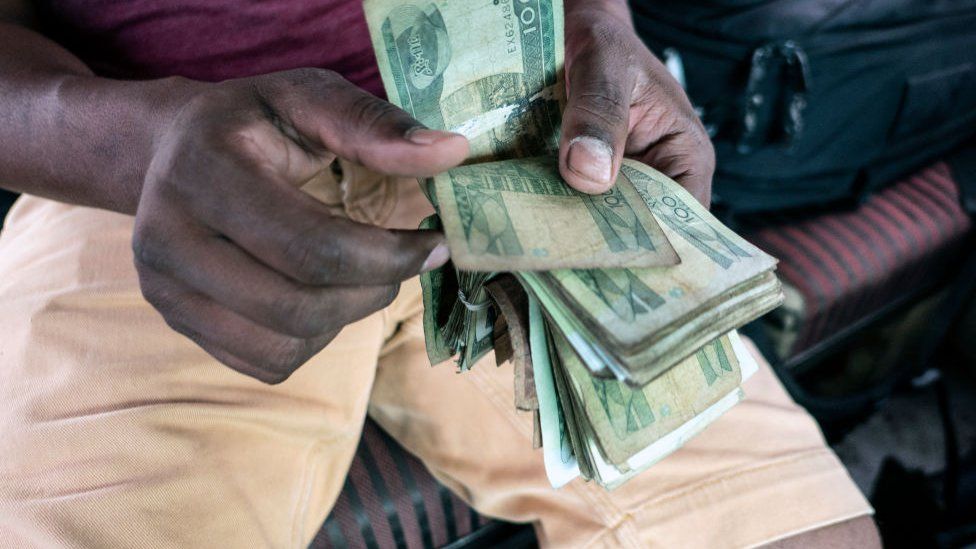 Man counting local Ethiopian currency birr notes