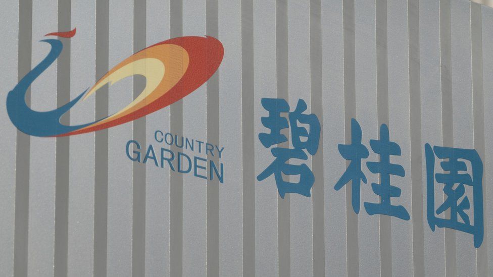 A corporate logo is seen at the entrance of Country Garden office building.