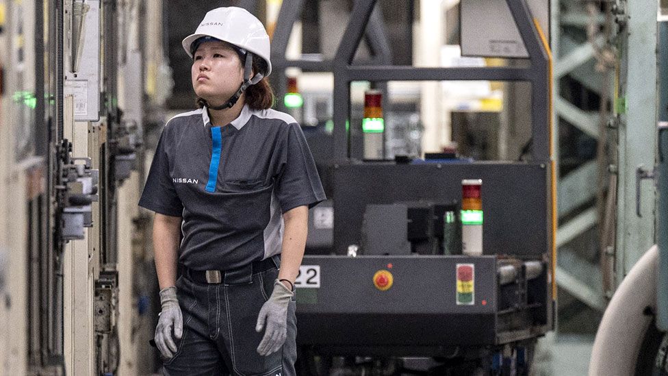 A worker at a Nissan factory in Yokohama, Japan