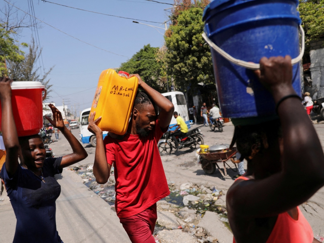 Uneasy quiet in Haiti capital after prime minister pledges to step down